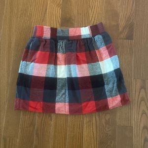 Adorable KAVU Buffalo red/black/cream skirt…size L elastic waist
